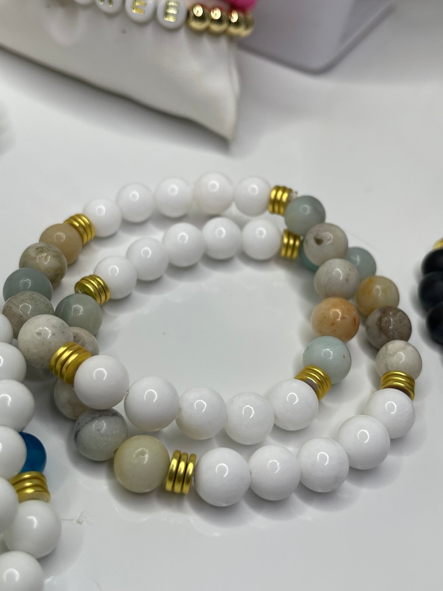 Sea green agate white mountain jade beaded bracelet with hematite gold spacers